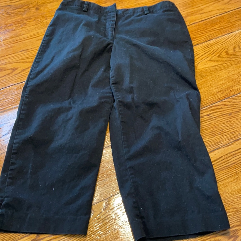 Liz Claiborne black capris, size 14.  Zip front.  Pockets. Splits at cuffs.